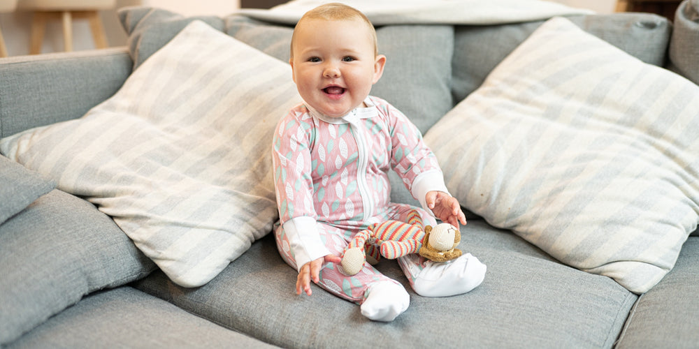 The Pink Leaves ZippySuit. The perfect baby grow has a 2-way zip for quick and easy changes, foldable mitts and foldable feet pouches.