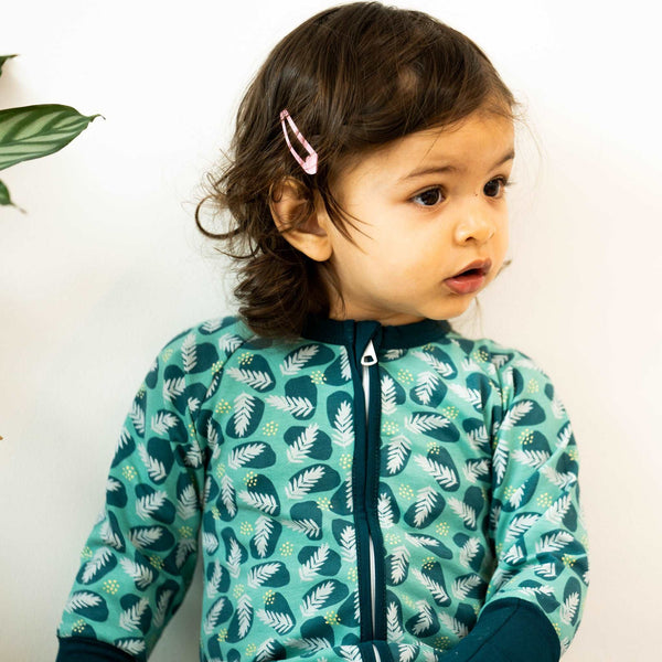 The Green Leaves ZippySuit. The perfect baby grow has a 2-way zip for quick and easy changes, foldable mitts and foldable feet pouches.